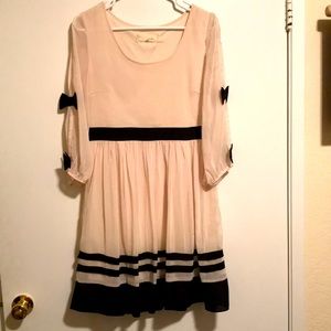 Cream and black sailor dress with bows